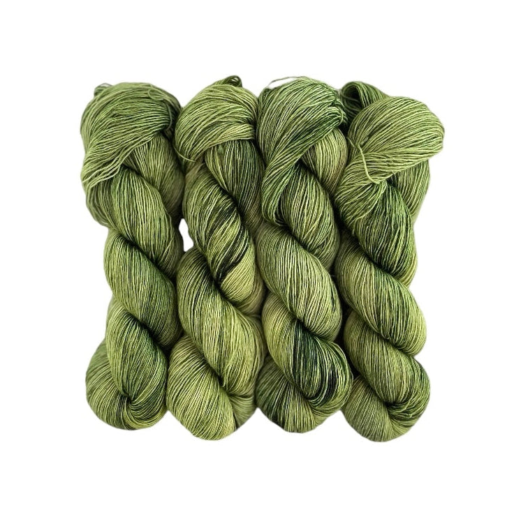 A very soft and lustrous single ply yarn with a loose twist, resulting in a velvety texture with slight variations in thickness. It is perfect for shawls and cowls where the silk content gives the items sheen and drape. The silk reflects the light to give a lustrous finish