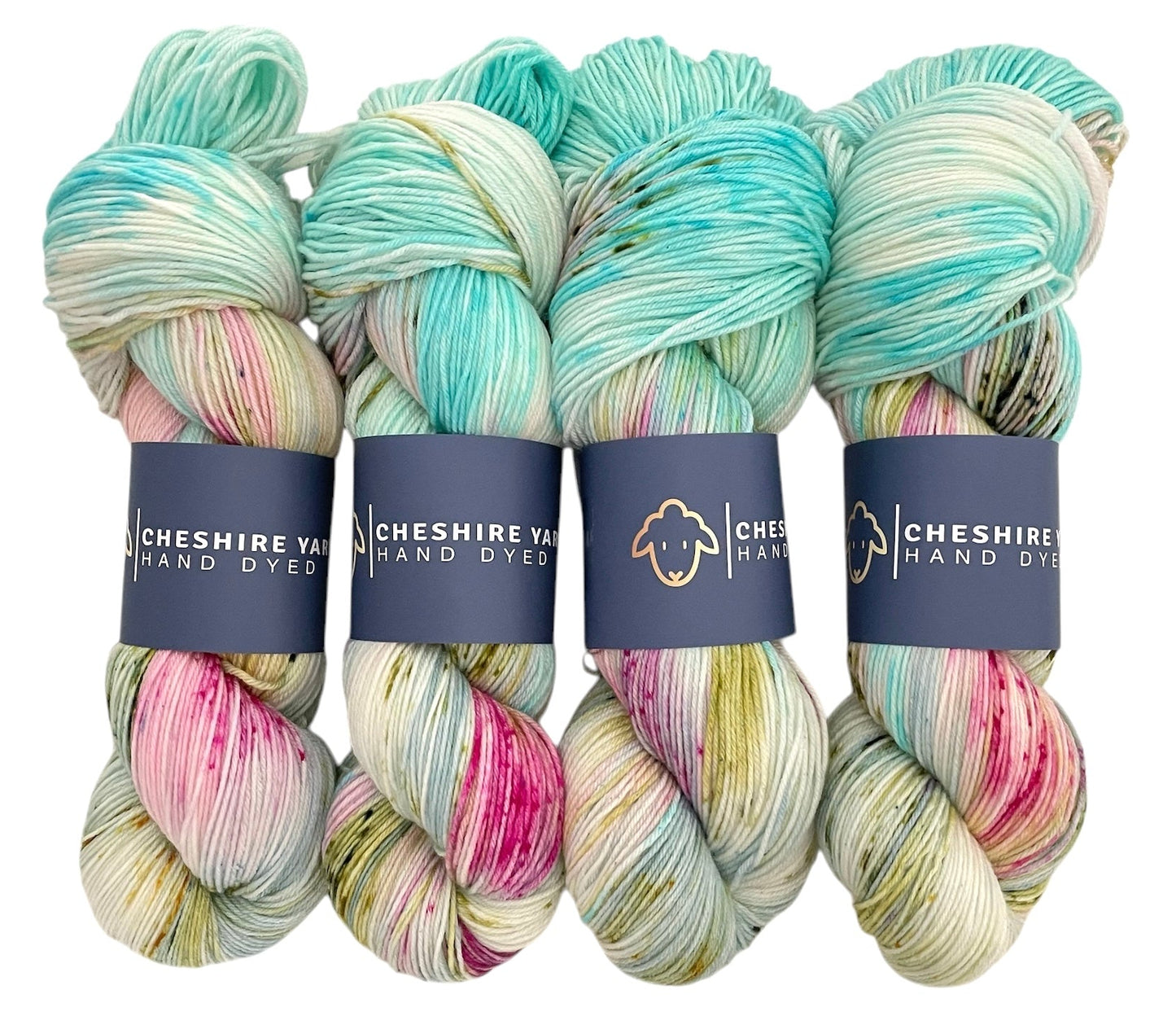 Four skeins of fingering sock weight superwash merino and nylon wool, hand dyed in pale shades of pink, yellow and green.