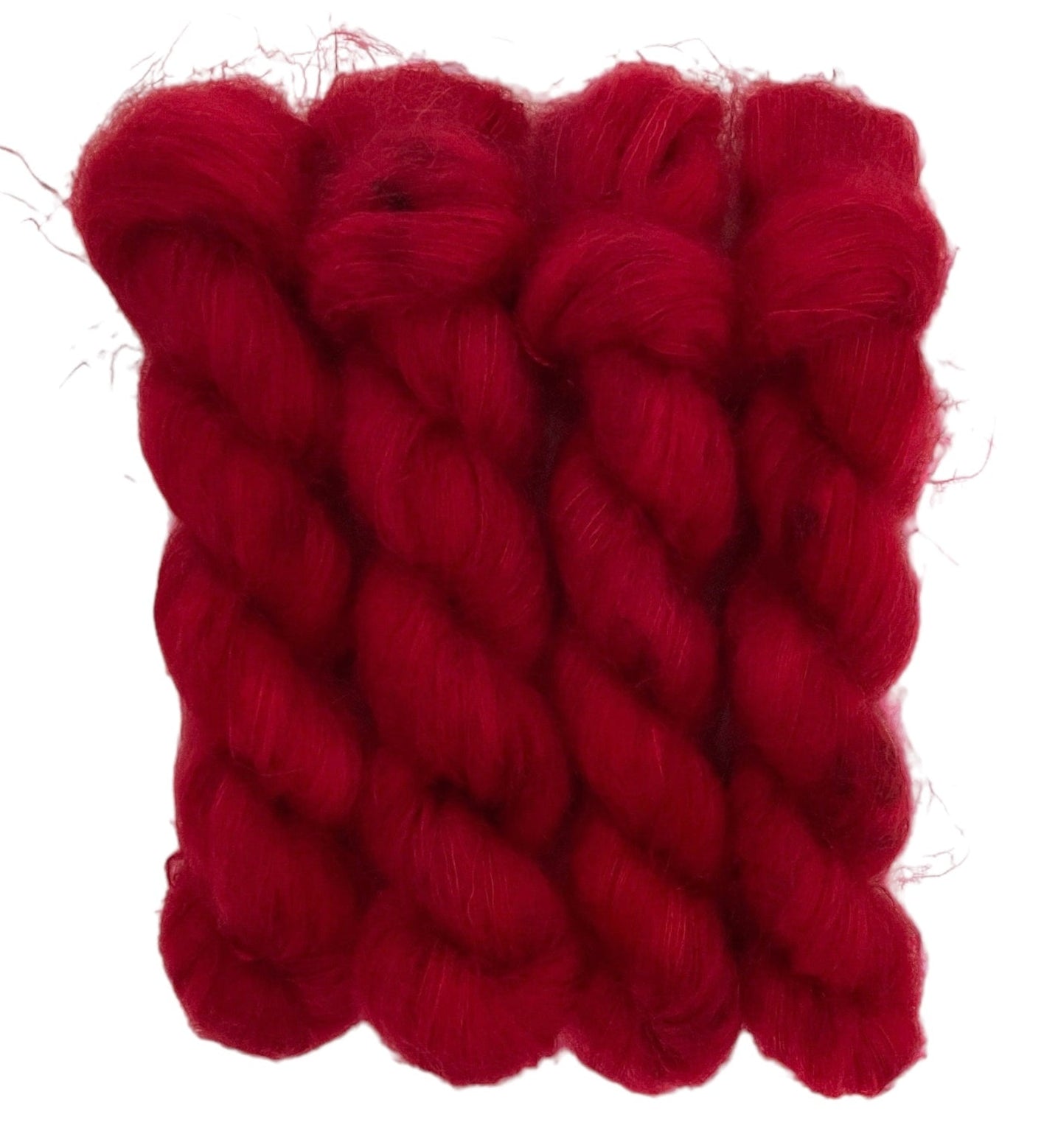 Four red hand dyed skeins of lace weight mohair and silk yarn on a white background.