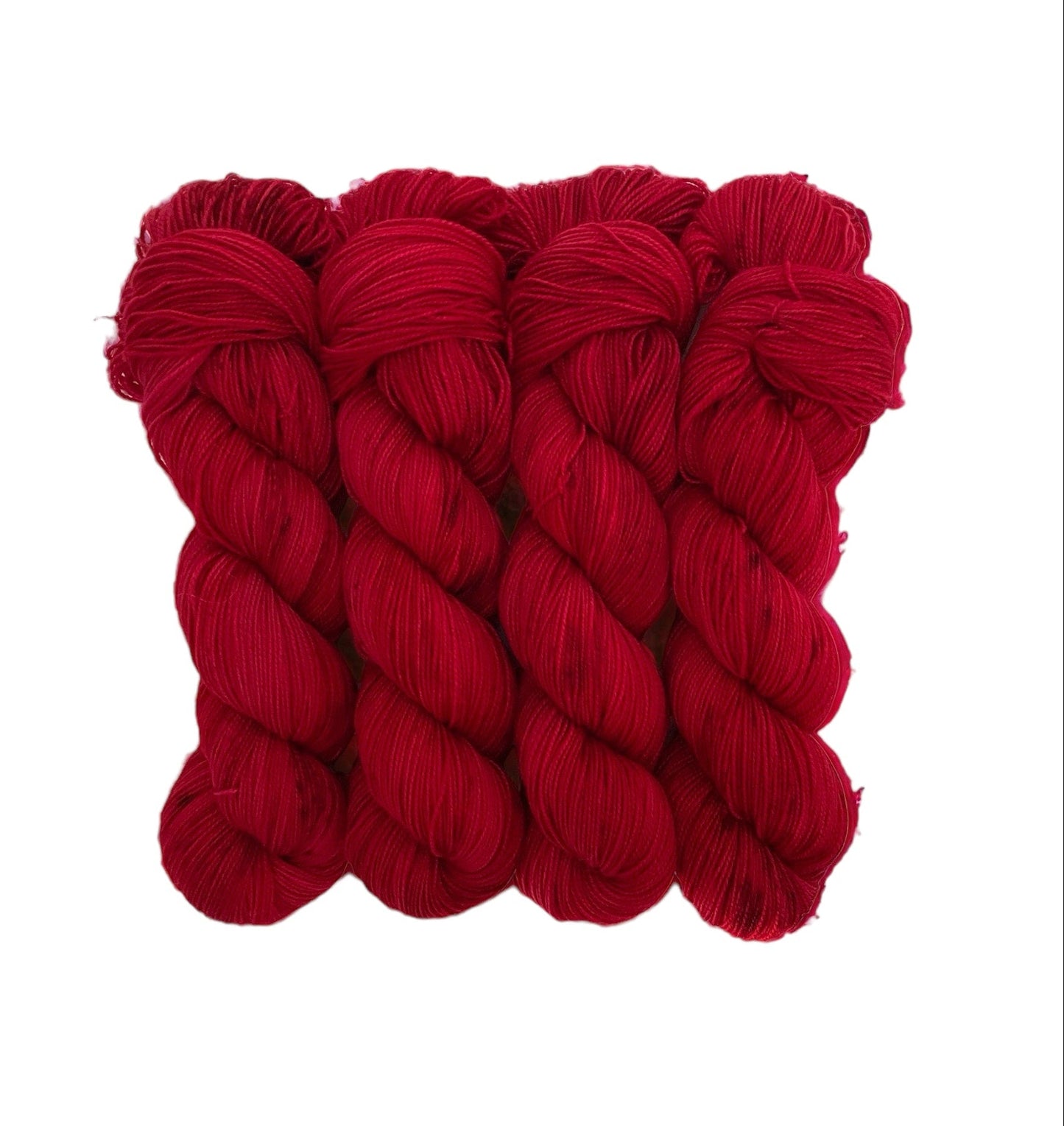 Expertly hand dyed in vibrant red, this luxurious yarn is made with a soft and durable blend of British Blue Faced Leicester Wool and Nylon. Perfect for knitting or crocheting socks and other delicate items, this fingering weight yarn comes in a generous 100g skein. Elevate your crafting with this exquisite yarn.