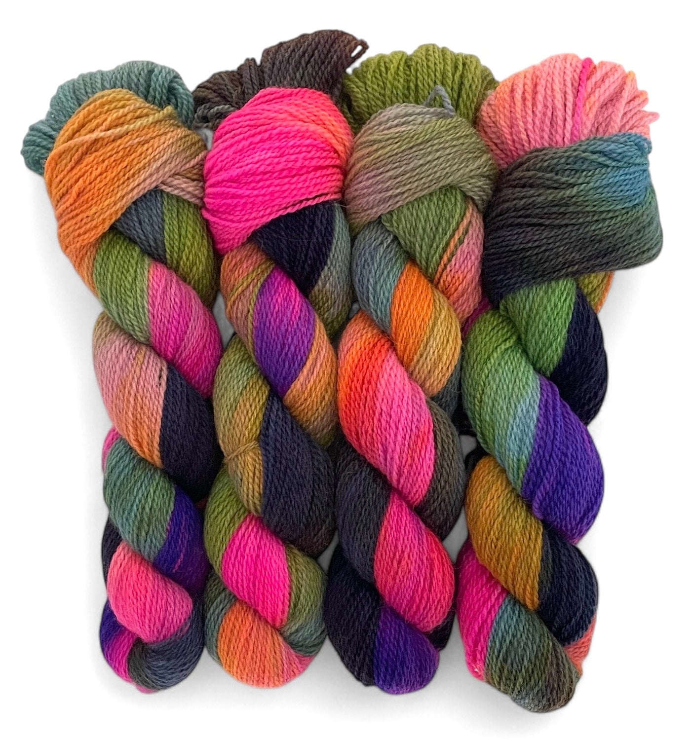 Four skeins of non superwash fingering weight merino and bluefaced leicester yarn, hand-dyed in assorted colors, including pink, green, blue, and purple.