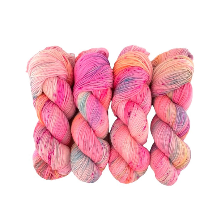 Add a unique touch to your knitting projects with Ooh La La Hand Dyed Yarn. Made from 100% superwash merino wool, this colourful yarn adds a playful element to your designs. With a fingering/sock weight and 100g skein, create stunning pieces with ease.