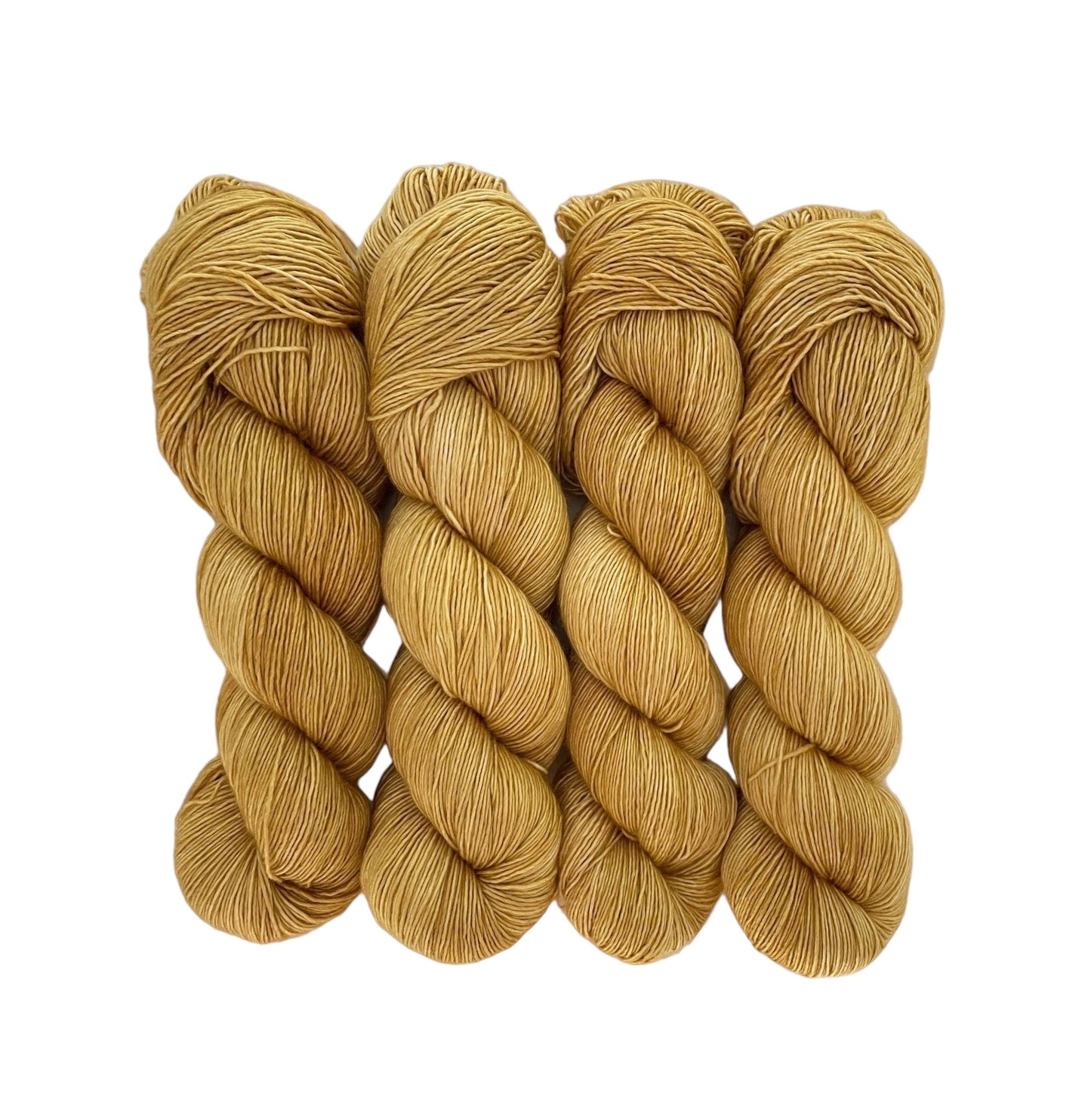 A very soft and lustrous single ply yarn with a loose twist, resulting in a velvety texture with slight variations in thickness. It is perfect for shawls and cowls where the silk content gives the items sheen and drape. The silk reflects the light to give a lustrous finish.