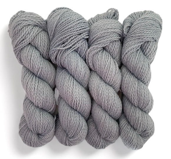 Four skeins of aran weight non superwash merino and baby alpaca wool, hand dyed grey.