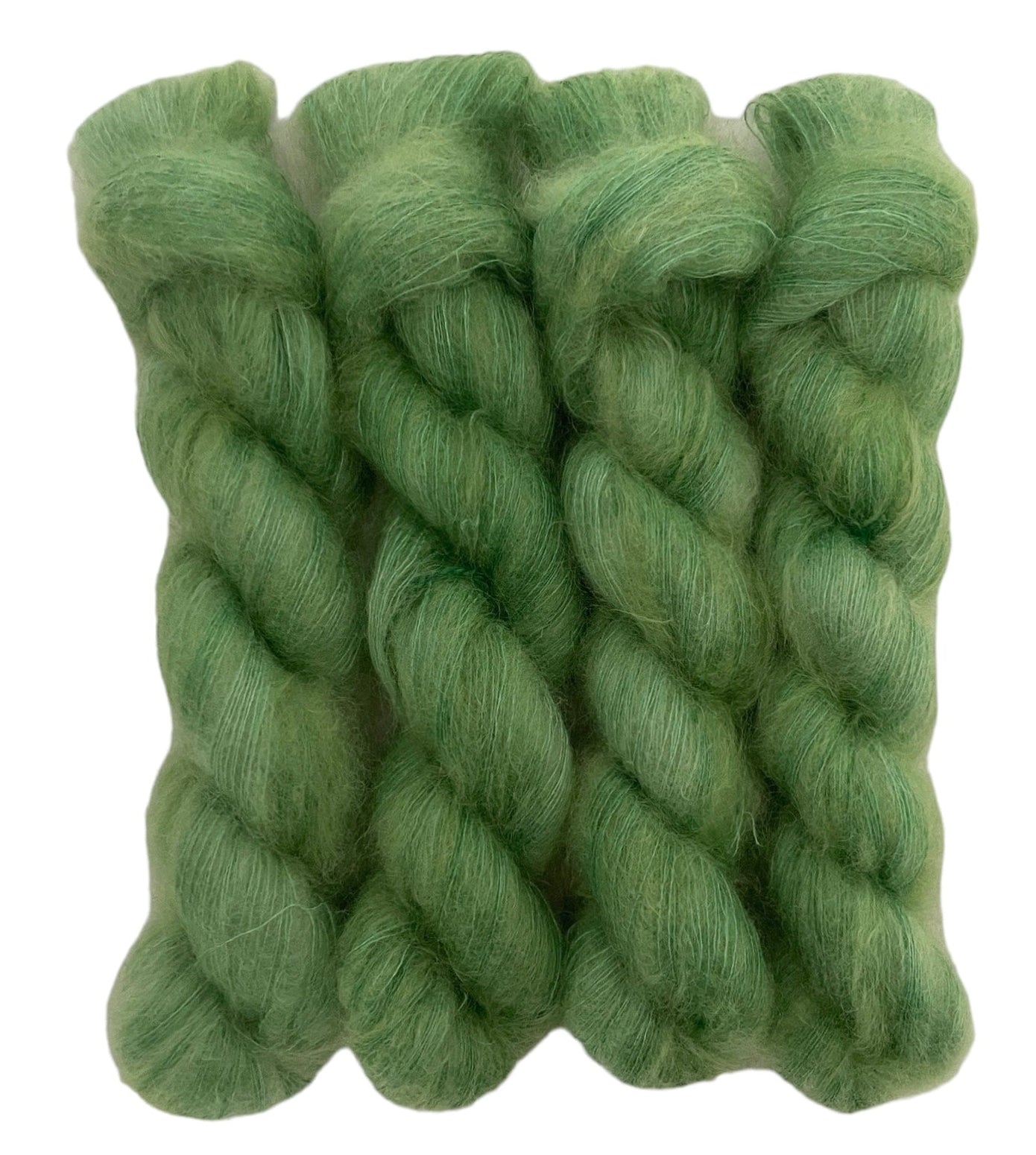 Four green hand dyed skeins of lace weight mohair and silk yarn on a white background.