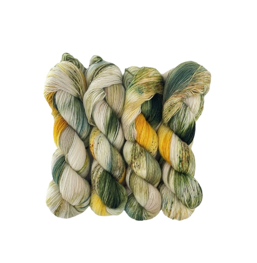 Our MUSTARD FIELD yarn is a beautiful blend of yellow, cream, and white. Elevate your knitting projects with this high-quality, one-of-a-kind yarn. Perfect for adding a pop of color to any design.
