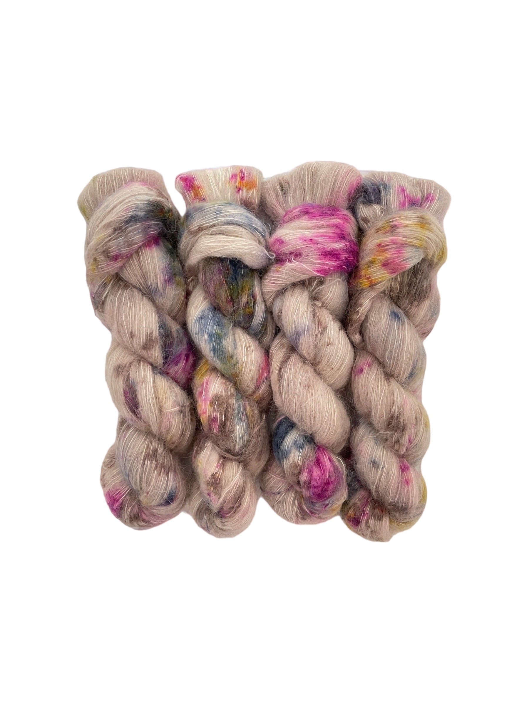 Beautifully soft and light as air, this luxurious blend of Suri Alpaca and silk is a delight to wear against the skin. Can be used on its own (held single or double) or in combination with other yarns to add fluffy texture to your projects. A perfect substitute for those sensitive to mohair.