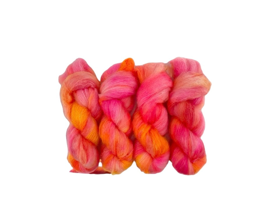 Elevate your knitting with our BRIGHT SUNSHINE Big Mohair yarn! Made with a luxurious blend of mohair, merino wool, and nylon, this hand-dyed yarn features vibrant shades of bright pink and orange. Perfect for double knit projects, each 100g skein adds a touch of warmth and texture to your creations.