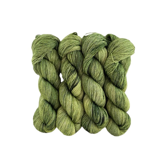 A very soft and lustrous single ply yarn with a loose twist, resulting in a velvety texture with slight variations in thickness. It is perfect for shawls and cowls where the silk content gives the items sheen and drape. The silk reflects the light to give a lustrous finish