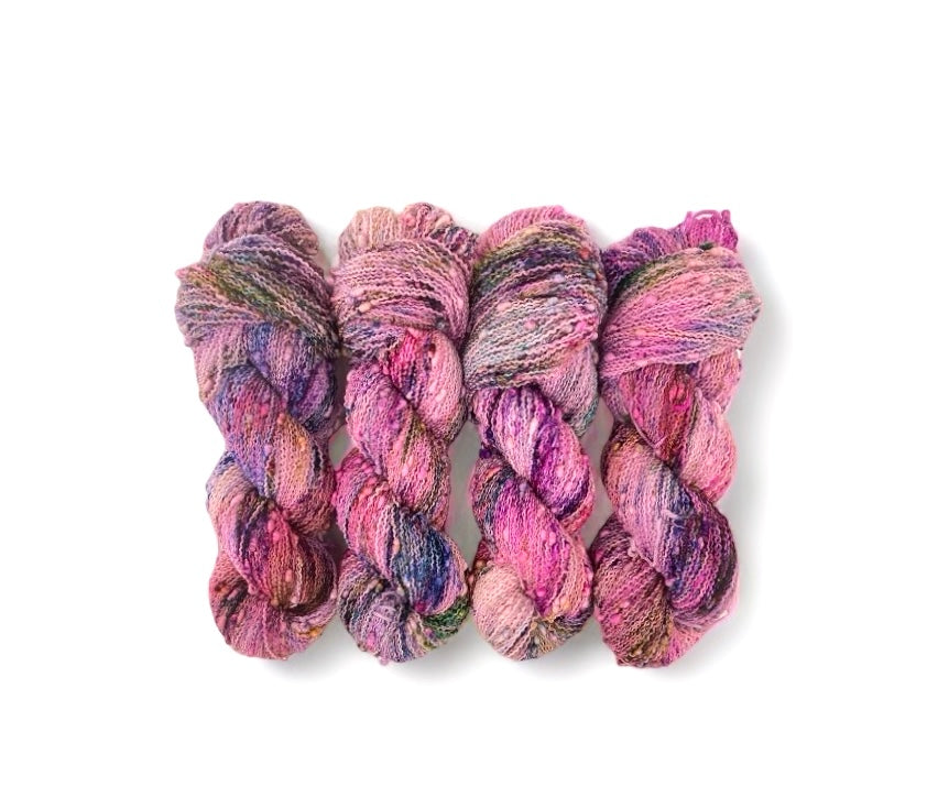 BLING yarn offers a unique blend of merino and nylon for added durability. The textured slub design adds depth and dimension to any project. Each 100g skein is perfect for lightweight, yet sturdy, fingering weight projects.