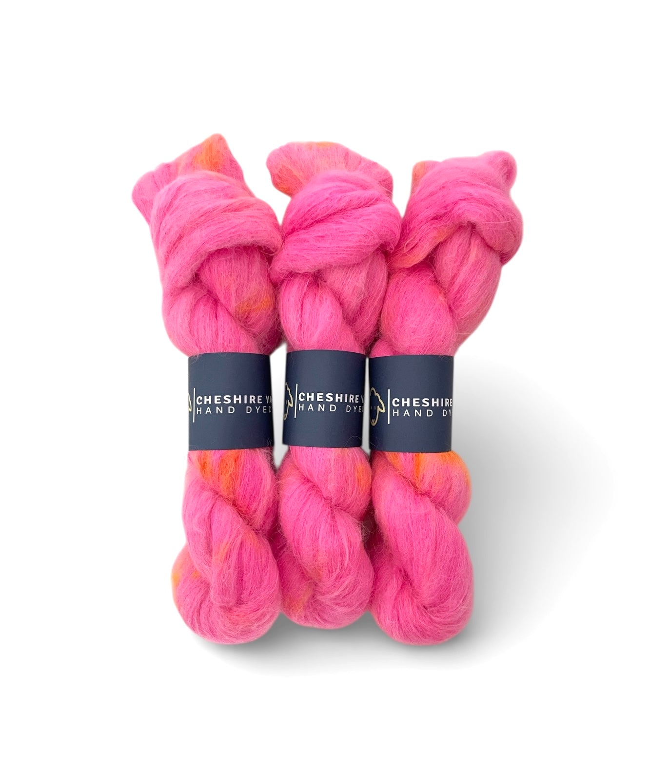 Lace weight Suri Alpaca and Mulberry Silk yarn in a pink and orange hand-dyed blend by Cheshire Yarn on a white background - 3 skeins