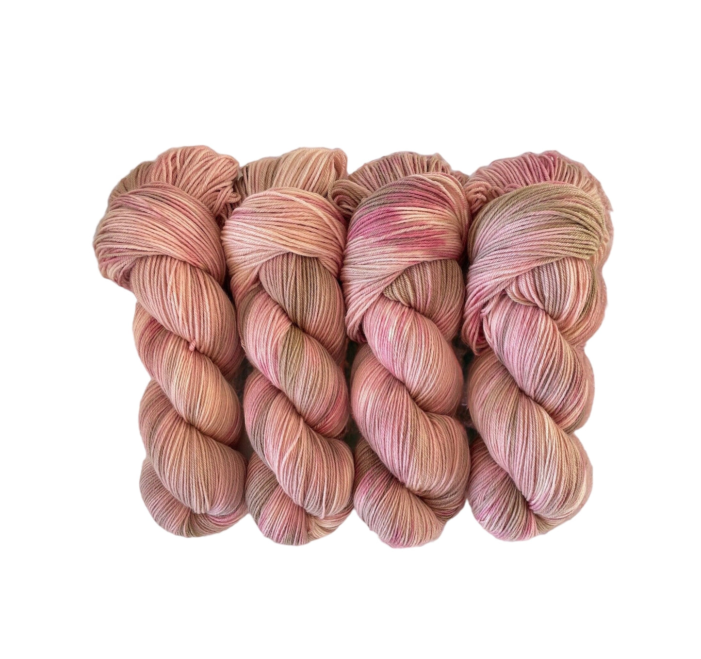 Create beautiful, one-of-a-kind pieces with SWEET TRUFFLE hand dyed yarn. The soft, dusty pink and beige colors will add an elegant touch to any project. With expert craftsmanship and attention to detail, this yarn will elevate your creations to new levels of sophistication.