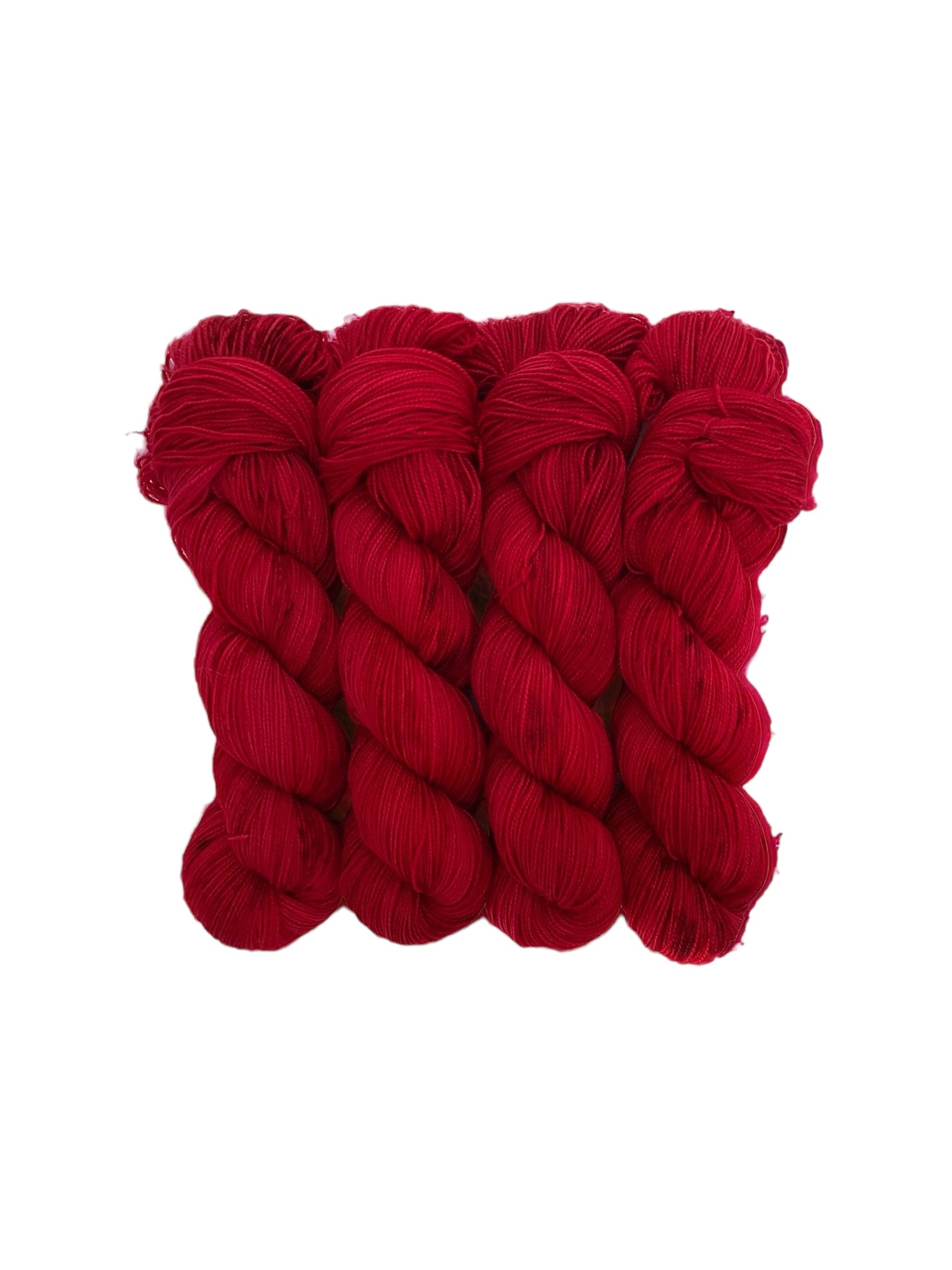 Expertly hand dyed in vibrant red, this luxurious yarn is made with a soft and durable blend of British Blue Faced Leicester Wool and Nylon. Perfect for knitting or crocheting socks and other delicate items, this fingering weight yarn comes in a generous 100g skein. Elevate your crafting with this exquisite yarn.