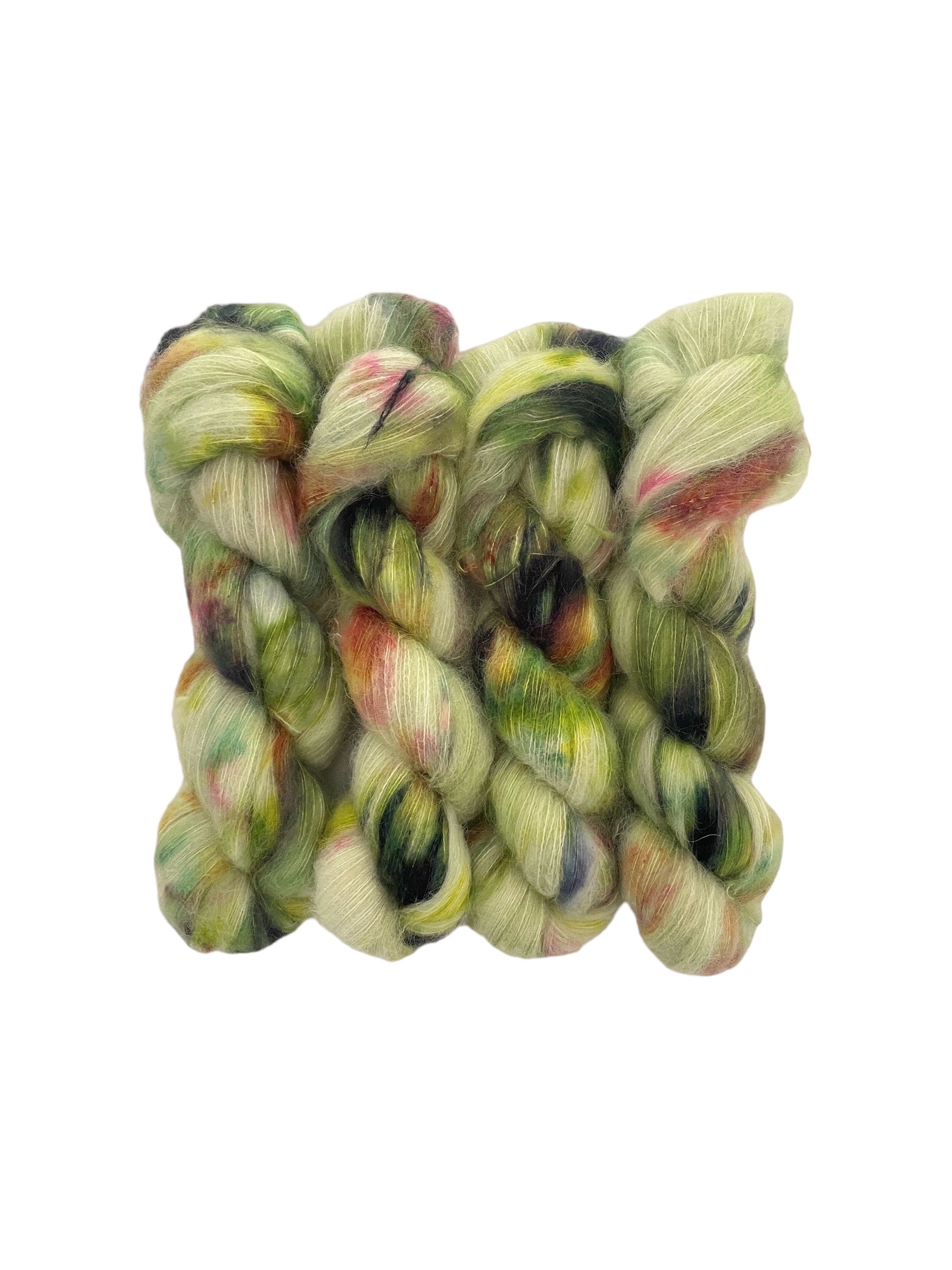 Each 50g skein is hand dyed with shades of green and a pop of orange, highlighting the softness of baby suri alpaca and the shine of mulberry silk. Elevate your knitting and crocheting projects with this unique blend.