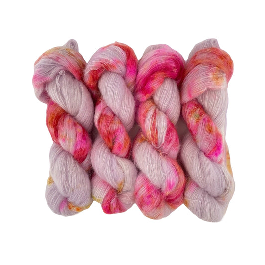 Beautifully soft and light as air, this luxurious blend of Suri Alpaca and silk is a delight to wear against the skin. Can be used on its own (held single or double) or in combination with other yarns to add fluffy texture to your projects. A perfect substitute for those sensitive to mohair.