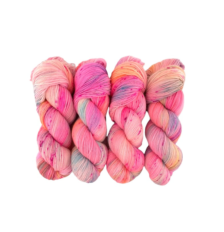 Add a unique touch to your knitting projects with Ooh La La Hand Dyed Yarn. Made from 100% superwash merino wool, this colourful yarn adds a playful element to your designs. With a fingering/sock weight and 100g skein, create stunning pieces with ease.