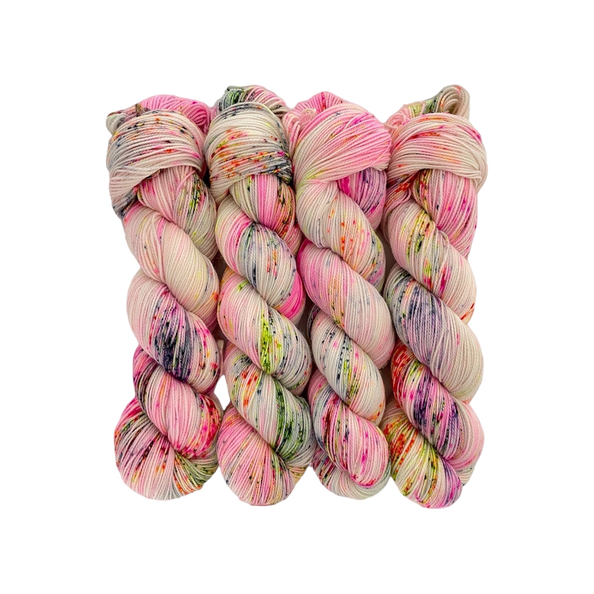 "Experience the vibrant colors and unique speckled pattern of DAZZLE ME Hand Dyed Yarn. Made from luxurious merino wool and durable nylon, this fingering/sock weight yarn is perfect for all your knitting and crocheting projects. Each 100g skein is expertly hand-dyed for a truly one-of-a-kind experience."