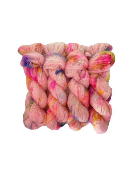 This delicate SUNDAE lace weight yarn is the perfect blend of baby suri alpaca and mulberry silk, making it soft and luxurious. Each skein is hand dyed, resulting in unique and vibrant colors. 