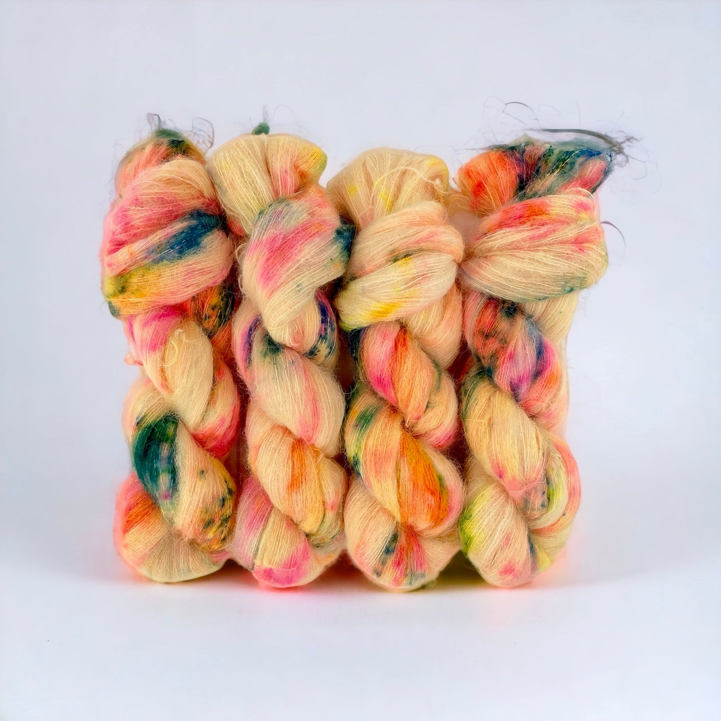 Tropical Smoothie Hand Dyed Yarn.  65% Baby Suri Alpaca.  35% Mulberry Silk.  Lace Weight.The vibrant yellow with orange, pink, green and blue hues add a touch of tropical paradise to any project.