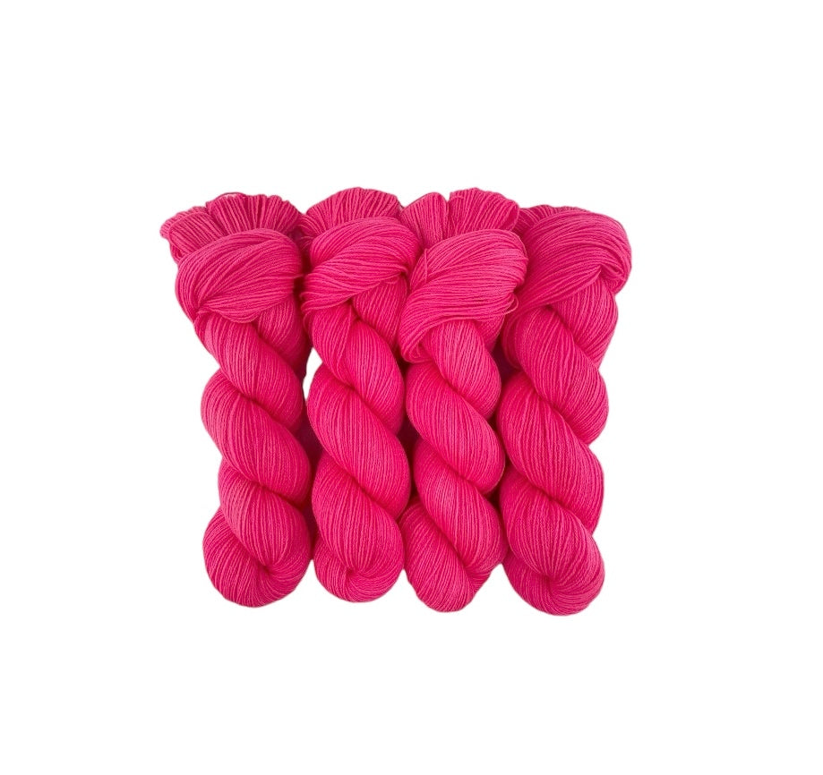 Hand dyed bright pink 100% Peruvian Highland Wool, LADY LOVE is the ideal choice for your next knitting or crocheting project. Each 100g skein of this fingering/sock weight yarn is made with precision and care, providing a soft and luxurious feel that will bring your creations to life.