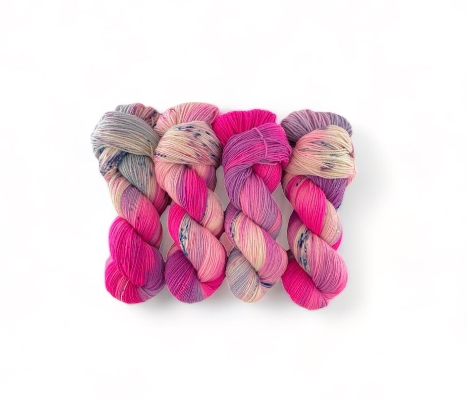 Made from 100% sustainable Merino wool, this fingering/sock weight yarn is perfect for eco-conscious knitters looking for high-quality, unique yarn. Each 100g skein is carefully hand-dyed for a one-of-a-kind result.