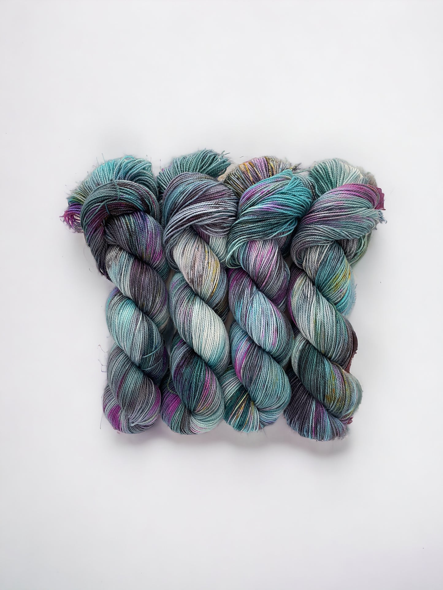 80% Superwash Blue Faced Leicester (BFL).  20% Nylon  High Twist fingering weight.  400yds / 365m per 100g skein.     Experience a stunning color palette with OCEAN RADIANCE's hand-dyed yarn in shades inspired by the sea. 