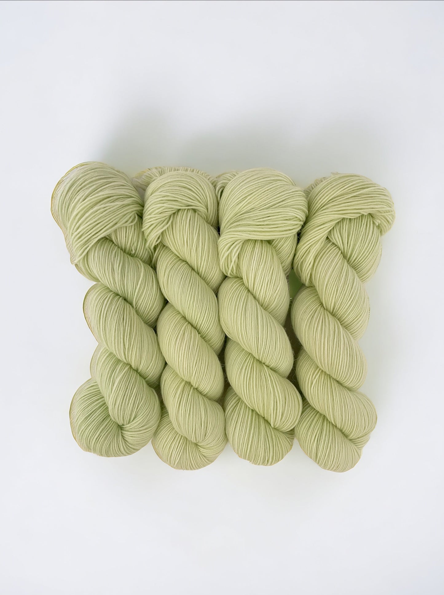 A  high-quality blend of alpaca, merino, and nylon, making it both soft and durable.  Perfect for any project, Cool Cucumber will bring both color and durability to your knitting or crocheting.