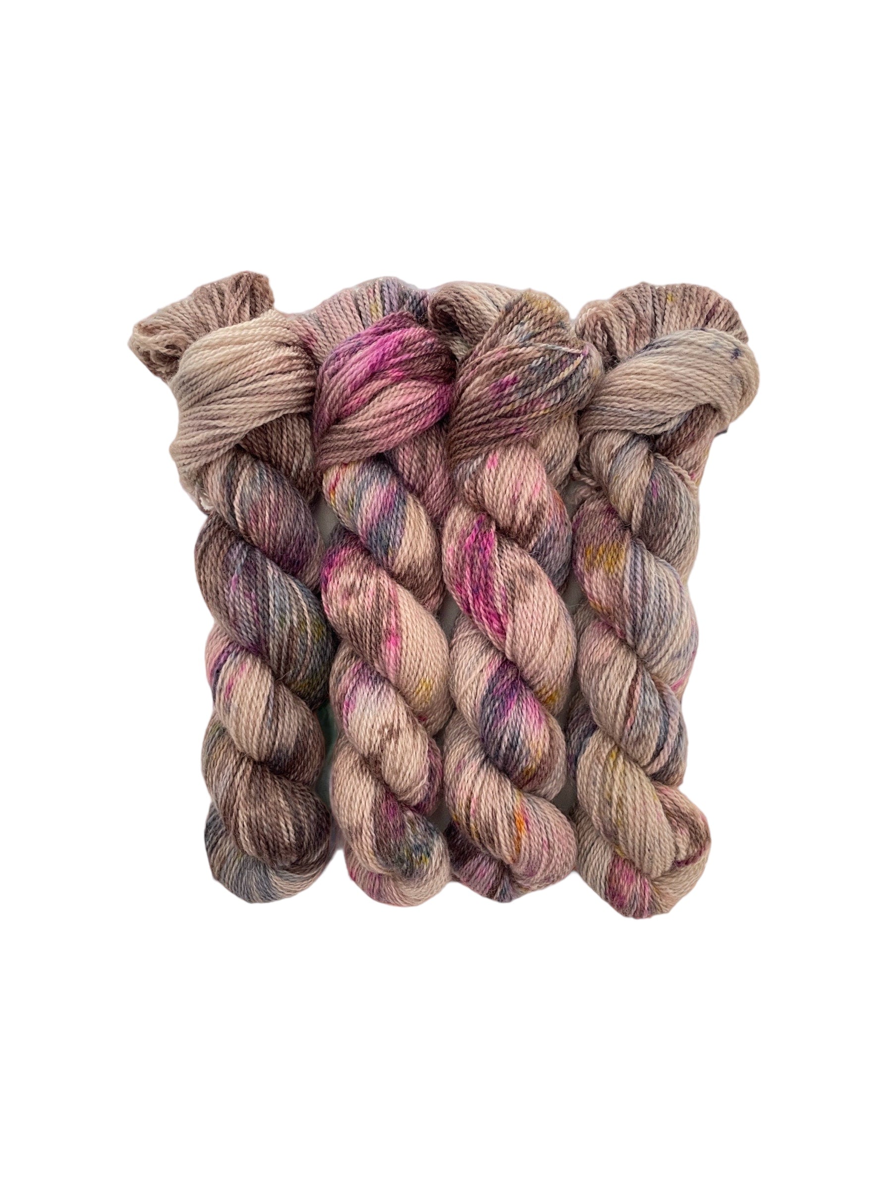 A luxurious Bluefaced Leicester and Merino wool, BEIGE DAZE Fingering/Sock Weight Yarn offers a unique and elegant addition to any project. Enjoy the softness and durability of this 50g skein while creating your next masterpiece.