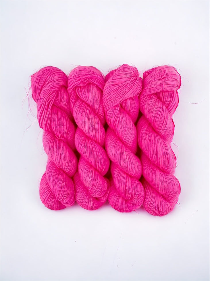 Expertly hand dyed, BUBBLEGUM is a vibrant yarn that combines the softness of superwash merino wool with the durability of linen. With a bold pink hue and a luxurious feel, this fingering/sock weight yarn is perfect for creating unique and beautiful projects.