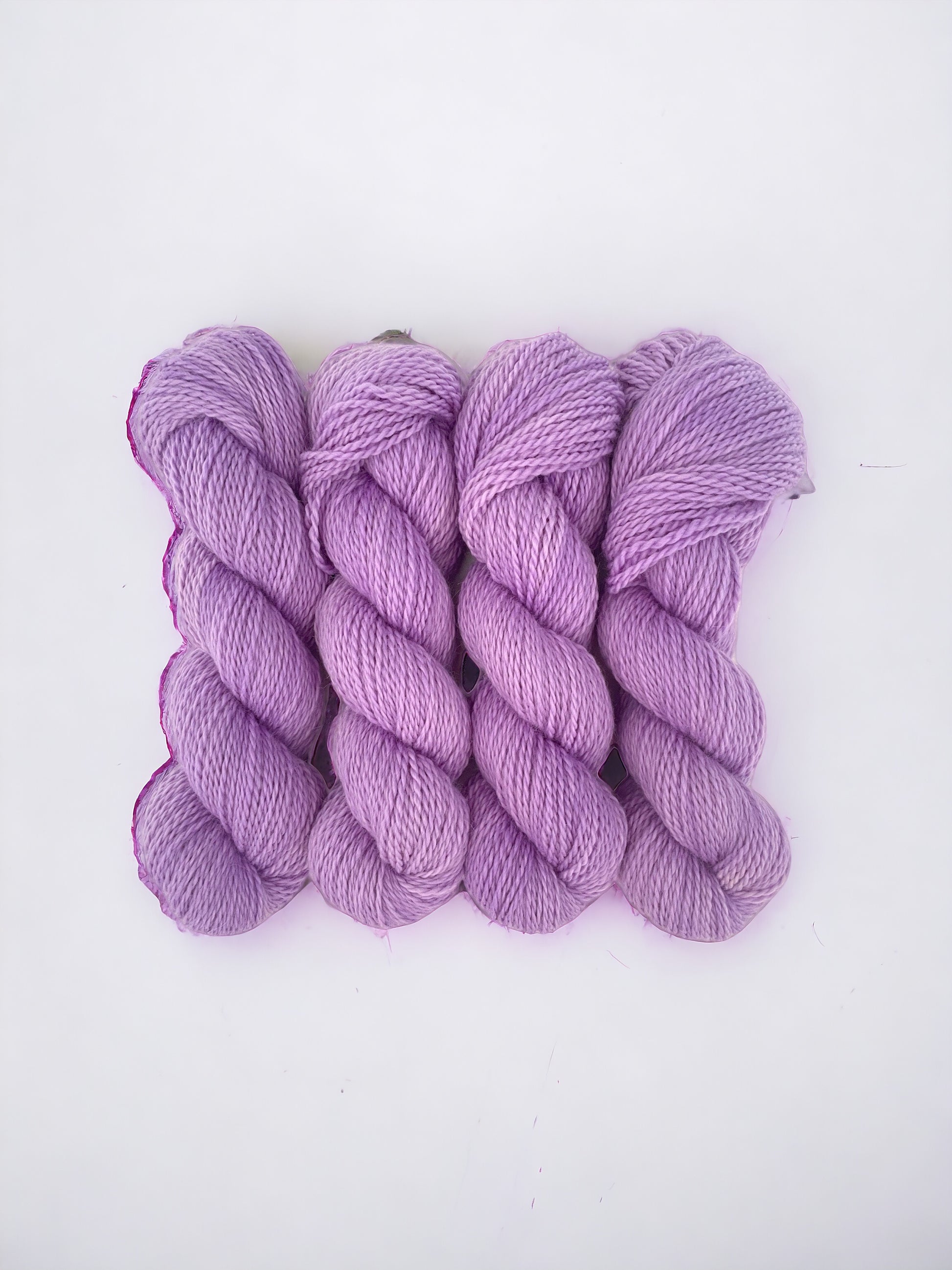 Our HYDRANGEA hand dyed yarn is made with a luxurious blend of baby alpaca and merino wool. Perfect for your next knitting or crochet project, each 100g skein is delicately crafted and dyed to ensure vibrant and consistent color throughout.