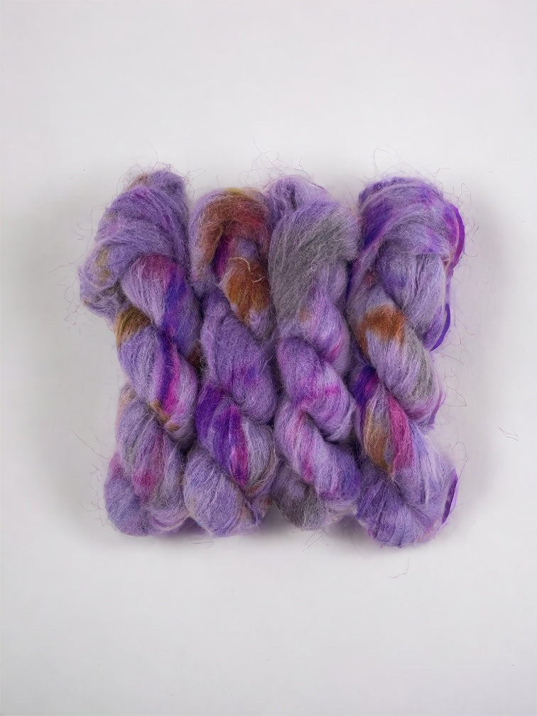 Beautifully soft and light as air, this luxurious blend of Suri Alpaca and silk is a delight to wear against the skin. Can be used on its own (held single or double) or in combination with other yarns to add fluffy texture to your projects. A perfect substitute for those sensitive to mohair.