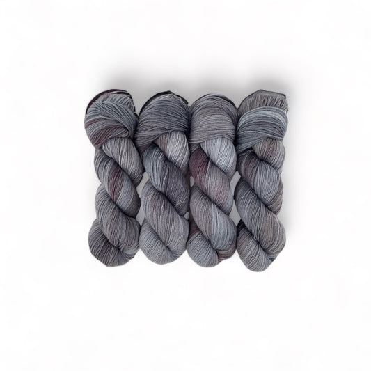 Made from 100% sustainable Merino wool, this fingering/sock weight yarn is perfect for eco-conscious knitters looking for high-quality, unique yarn. Each 100g skein is carefully hand-dyed for a one-of-a-kind result.