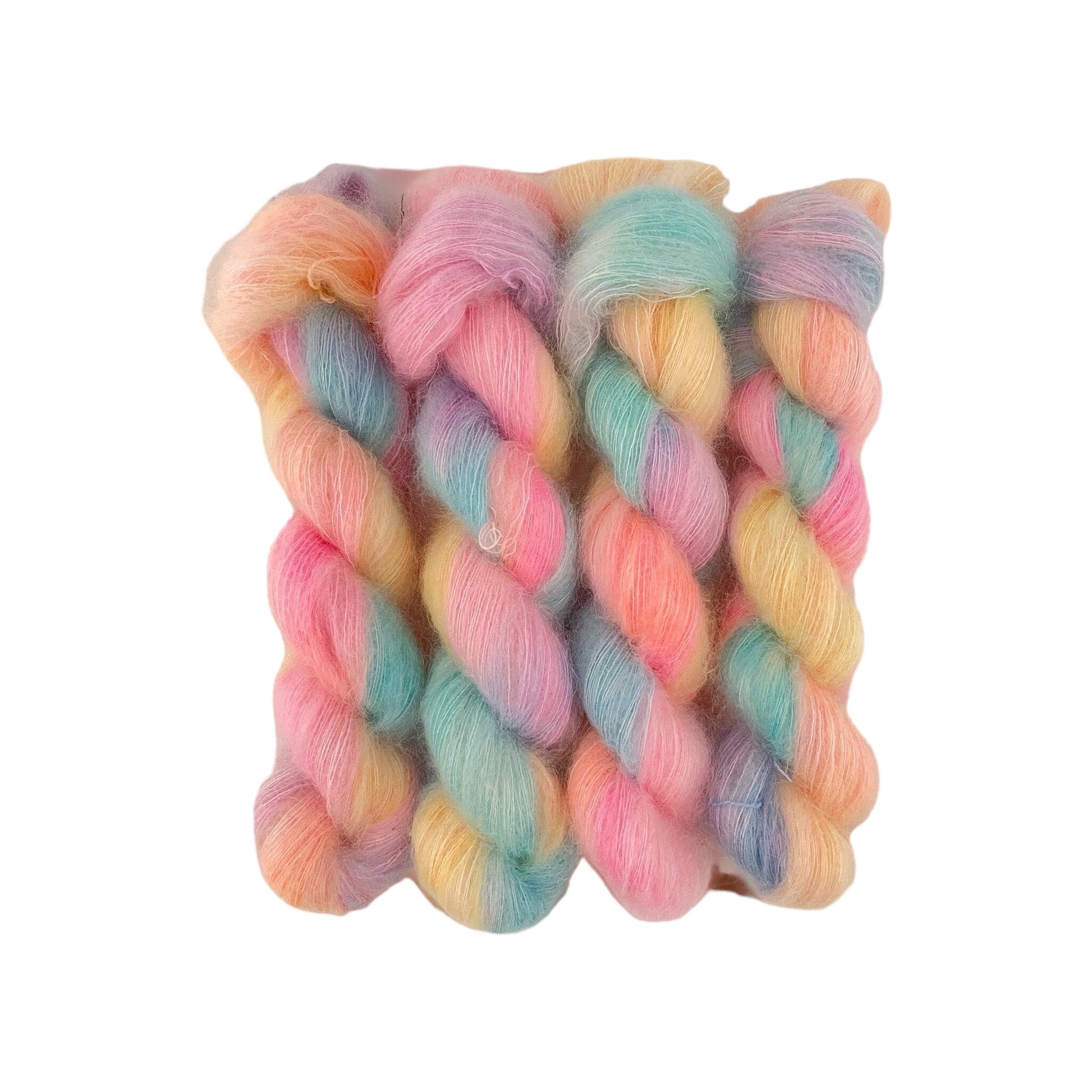 CANDY SHOP features hand dyed mohair and silk in a variety of vibrant candy colors. Experience the luxurious softness and quality of this one-of-a-kind product.