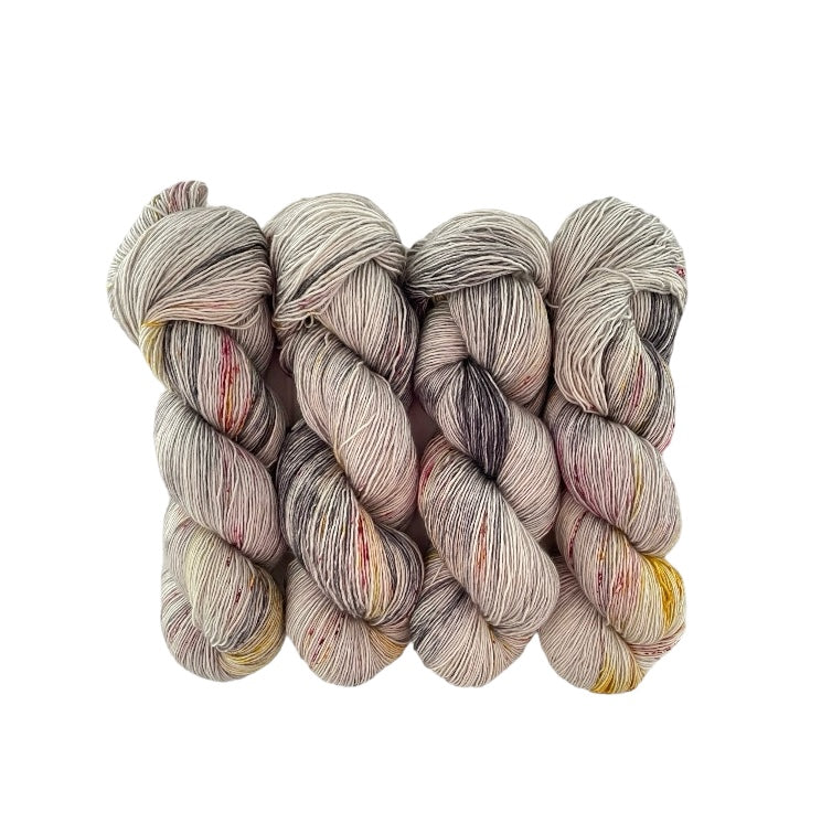 A very soft and lustrous single ply yarn with a loose twist, resulting in a velvety texture with slight variations in thickness. It is perfect for shawls and cowls where the silk content gives the items sheen and drape. The silk reflects the light to give a lustrous finish.