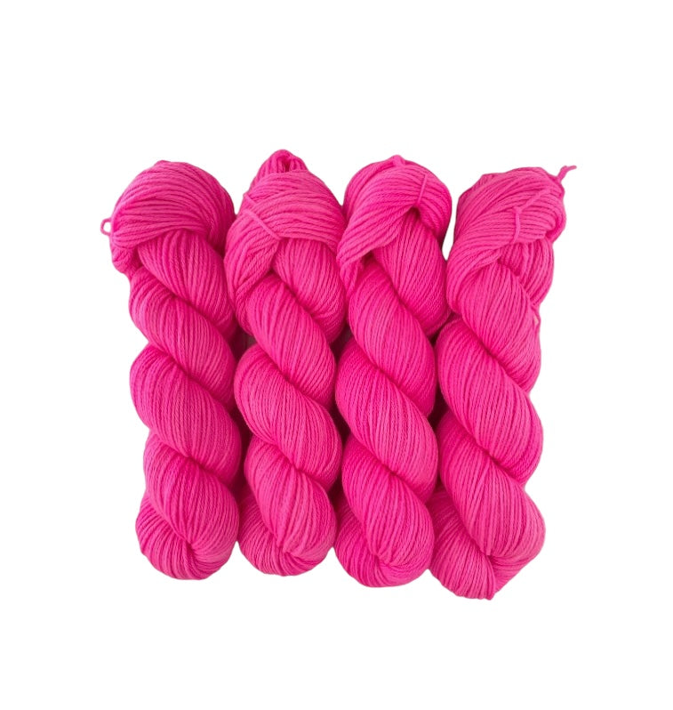 Made from 100% organic merino wool, our hand-dyed base of  bright pink offers a luxurious and eco-friendly choice for your wardrobe. 