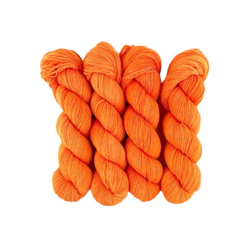 Expertly hand-dyed using premium British Blue Faced Leicester wool and nylon blend, ORANGE SQUASH yarn boasts a vibrant orange colour. This fingering/sock weight yarn is perfect for crafting durable and stylish accessories with a soft touch.